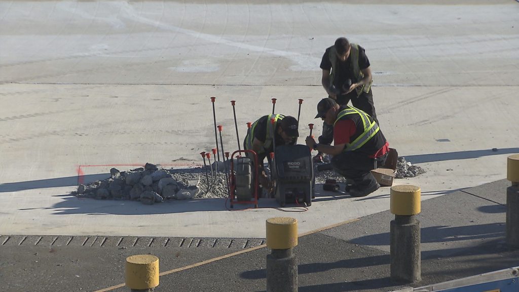 Workers on site at Kits Pool in Vancouver