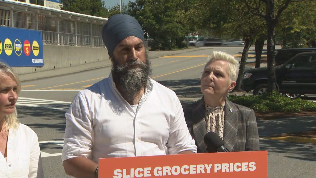 Jagmeet Singh speaking at a podium