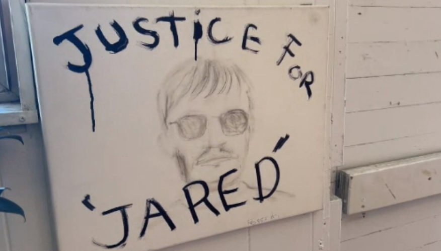 A 'Justice for Jared' sign in honour of Jared Lowndes, an Indigenous man killed by police in Campbell River on July 8, 2021. 