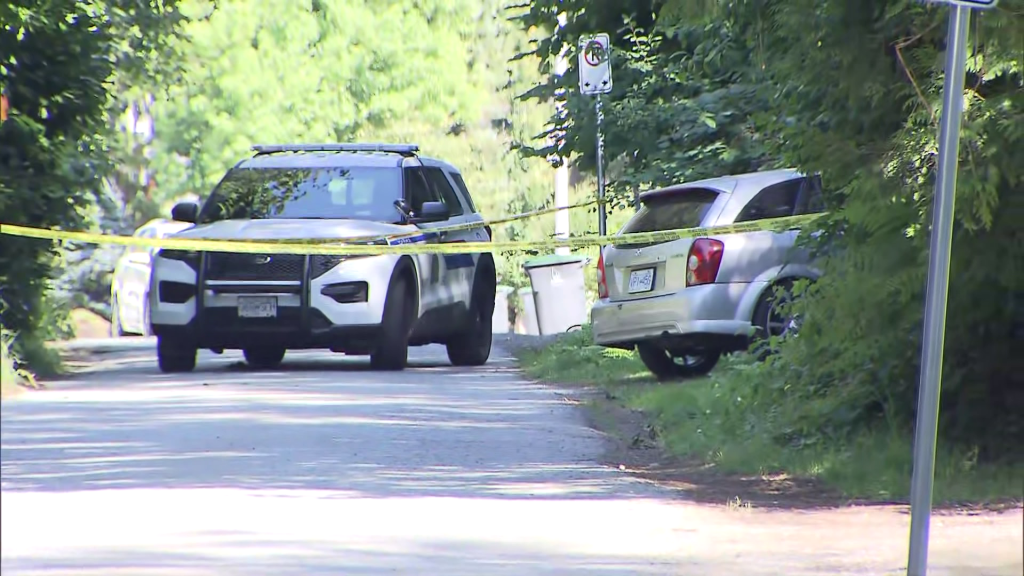 Police block off an area near 99A Avenue and 179 Street.