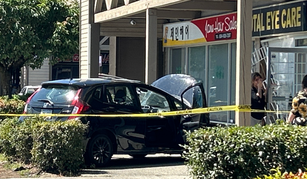 A car crashed into the front of a Coquitlam eye care clinic Friday, leaving a damaged storefront and vehicle.