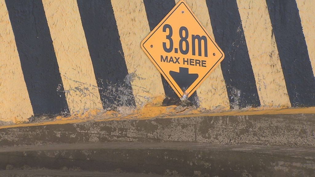 Damage is seen in Stanley Park on a pedestrian overpass.