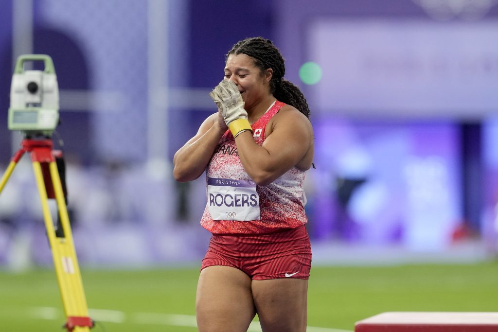 Canada's Camryn Rogers reacts after a throw in the women's hammer throw event at the Summer Olympics in Paris, Tuesday, Aug. 6, 2024. THE CANADIAN PRESS/Adrian Wyld