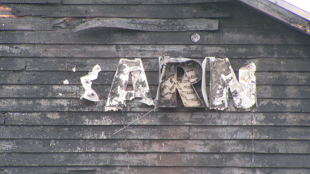 A burned out barn is seen in Cloverdale