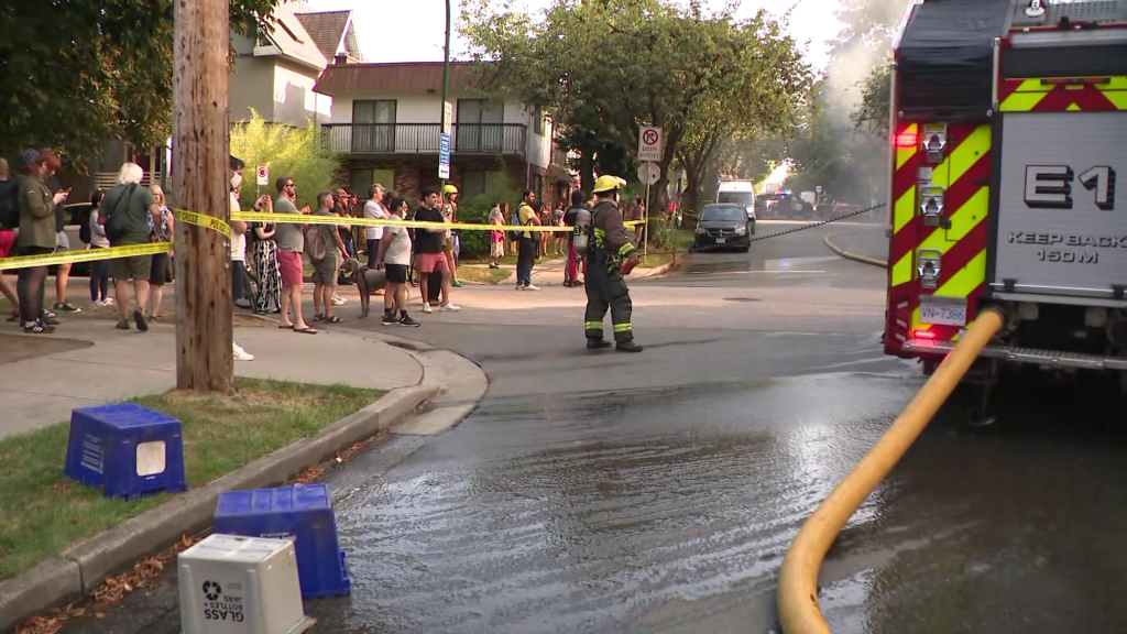 Vancouver Fire Rescue crews battle a blaze at 414 East 10th Avenue on Tuesday August 6, 2024.