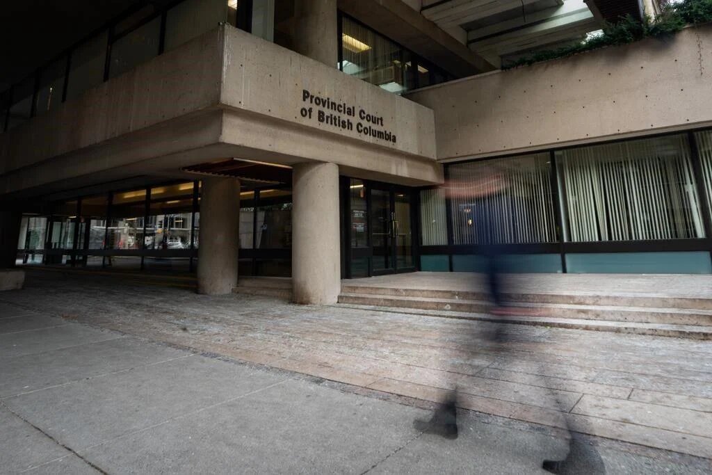 A person walks past the Provincial Court of British Columbia in Vancouver,