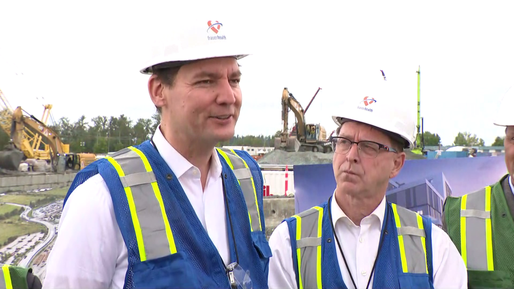 Premier David Eby and Health Minister Adrian Dix at the site of the new Surrey Hospital on Monday August 26, 2024.