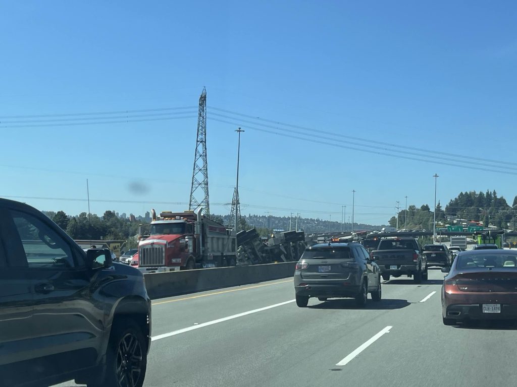 A tipped semi truck on the Port Mann Bridge in Coquitlam