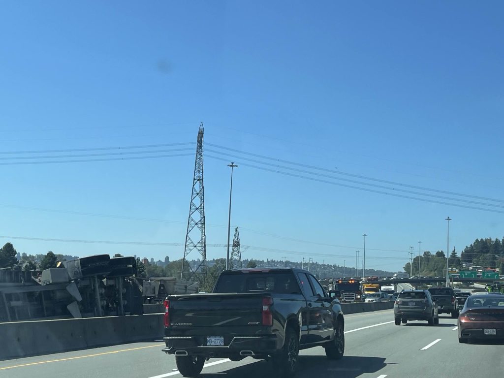 A tipped semi truck on the Port Mann Bridge in Coquitlam