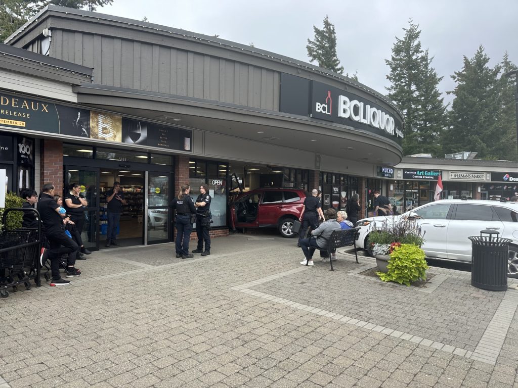 A vehicle crashed through the front window of a BC Liquor Store location in West Vancouver