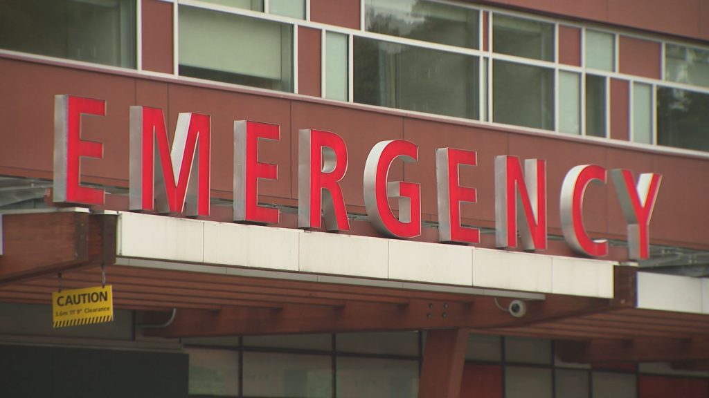 A sign for the emergency room at Surrey Memorial Hospital