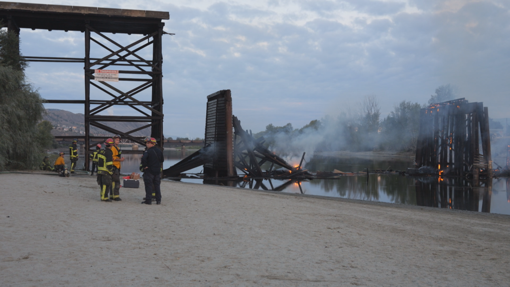 Kamloops Fire Rescue crews on scene of a major fire that caused the collapse of the iconic Red Bridge in Kamloops