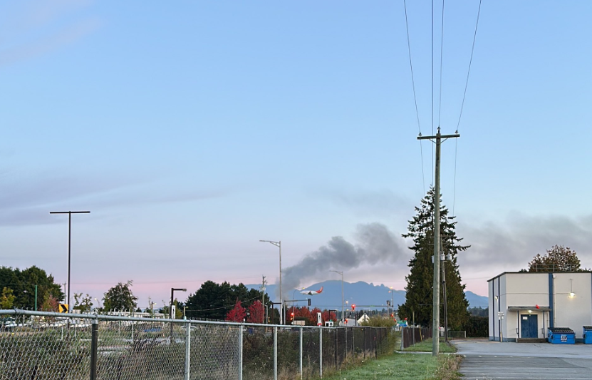 South Vancouver vacant house fire sending thick smoke into air