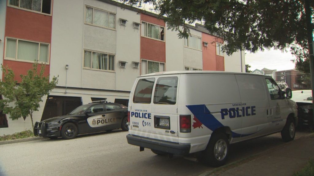 Vancouver Police stationed outside a building near Kingsway and Melbourne Street on Thursday October 3, 2024. (CityNews Image)