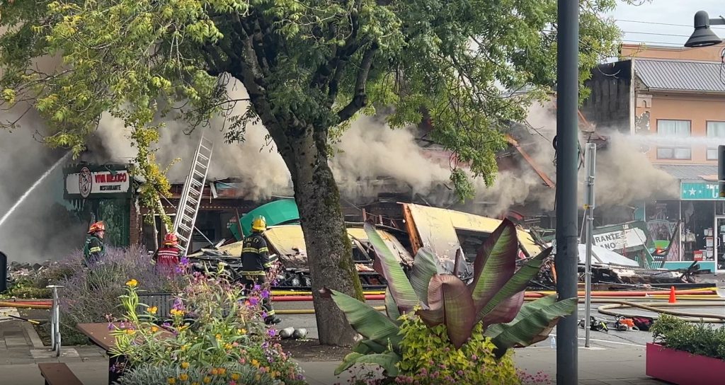 Massive fire at Langley restaurant leads to partial building collapse; crews continue to battle blaze