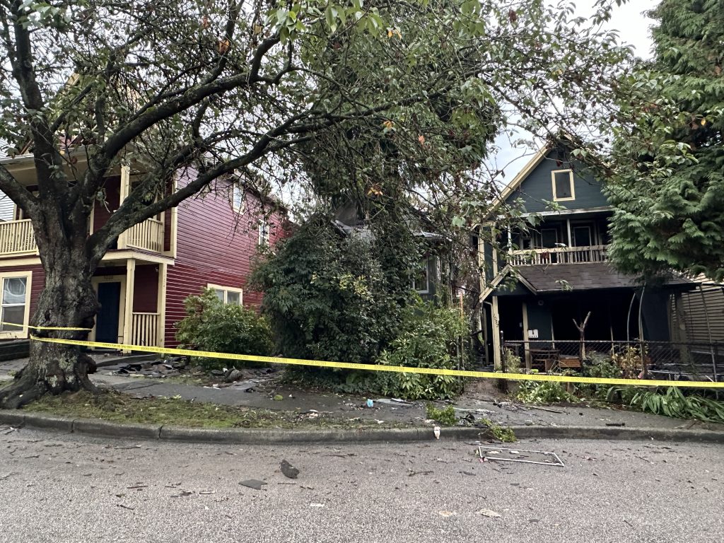 Two homes were likely destroyed in a massive East Vancouver fire Monday night. The blaze engulfed much of four houses on one street, with the charred remains seen on Tuesday, Oct. 8., morning. (CityNews Image / Monika Gul)