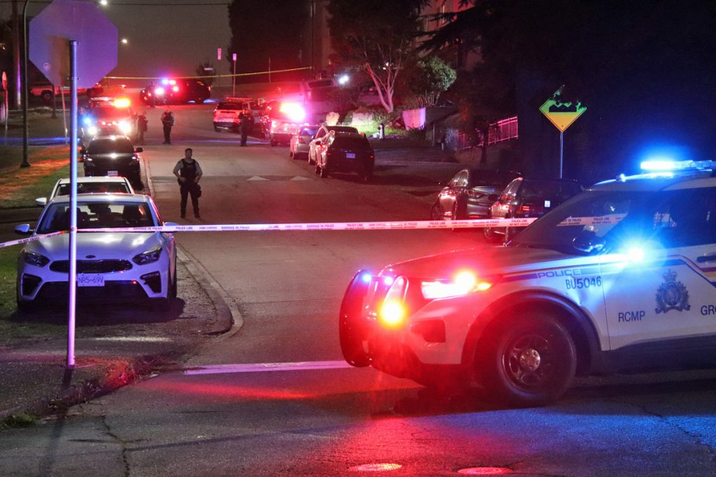 The Burnaby RCMP says officers were called after reports of shots fired in the area of Kitchener Street and Madison Avenue just after 7:45 p.m. (Credit Shane MacKichan)