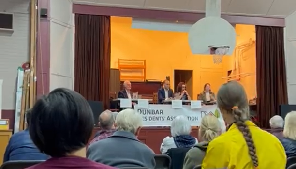 An all-candidates debate held in a gymnasium