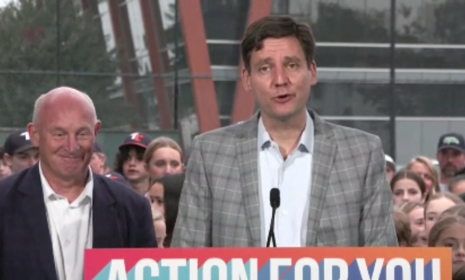 David Eby speaks at a podium