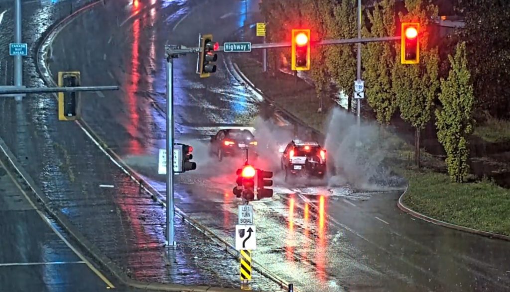 Water is shown pooling on the south side of the Kensington Ave overpass during an atmospheric river event Oct. 18, 2024.