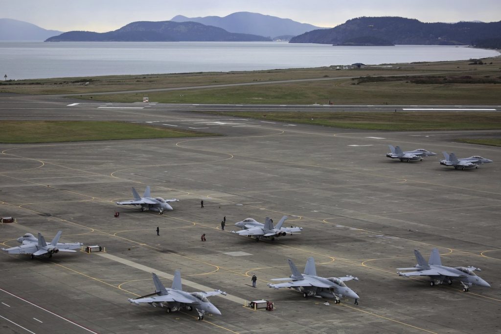 EA-18G Growlers, with some of San Juan Islands in the background, prepare for an exercise at Naval Air Station Whidbey Island, March 10, 2016.