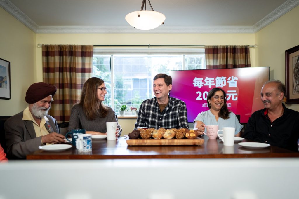 David Eby at a breakfast table in a home in Richmond