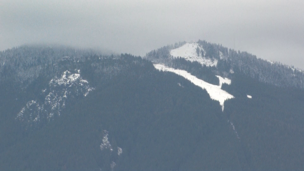 North Shore Rescue urges safety as early snow lands on mountains