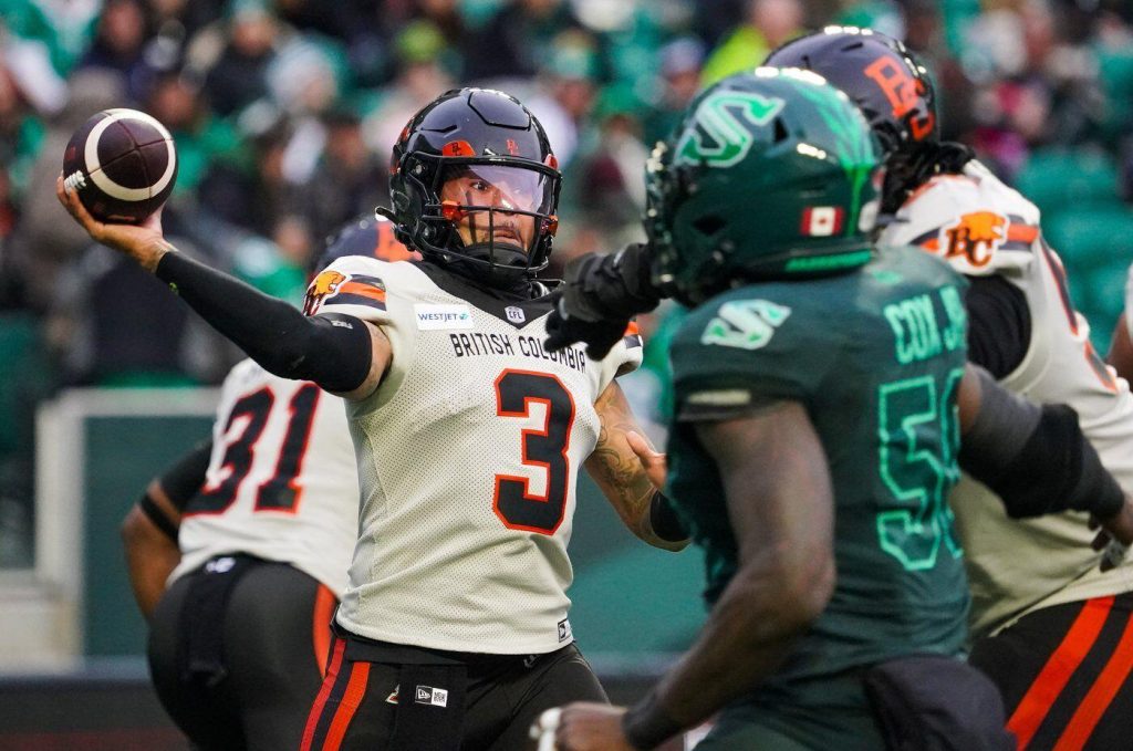 Vernon Adams Jr. throws a football