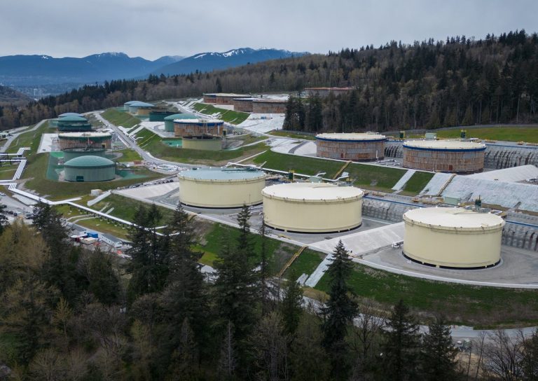 The Parliamentary Budget Officer estimates the Trans Mountain pipeline is worth less than it cost to build in an updated assessment of the controversial project. In this photograph taken with a drone, the Trans Mountain Burnaby Terminal tank farm is seen in Burnaby, B.C., on Thursday, April 4, 2024. THE CANADIAN PRESS/Darryl Dyck 