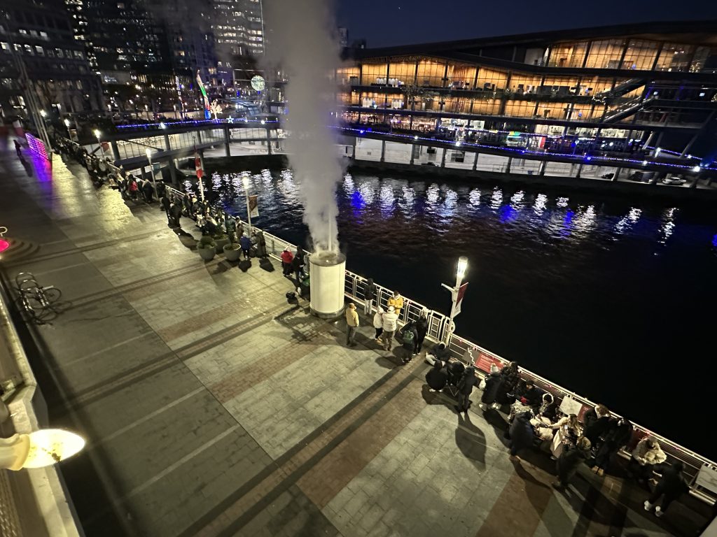 Fans line up at Canada Place waiting to get their hands on Taylor Swift merchandise. (CityNews / Monika Gul)