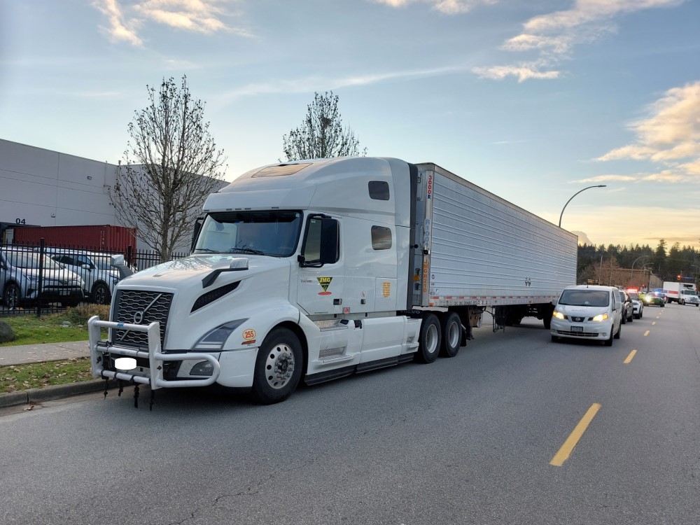 Damage is seen to vehicles on Industrial Avenue in Port Coquitlam.