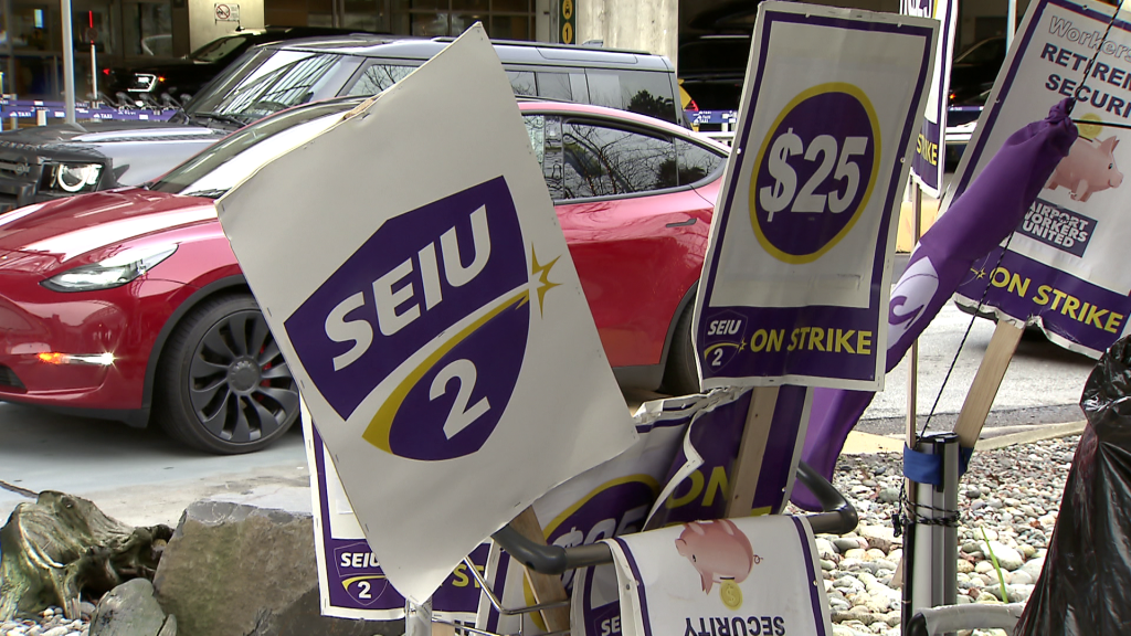 SEIU 2 Local union members demonstrate at Vancouver International Airport in Richmond, B.C. on Monday December 23, 2024.