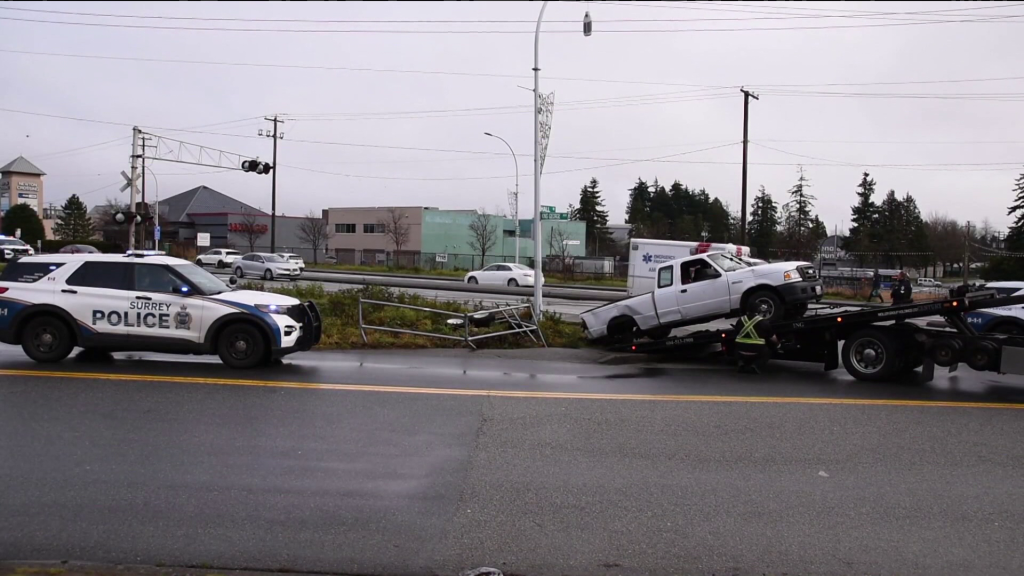 Damage is seen to a white pickup in Surrey on Sunday January 5, 2024.