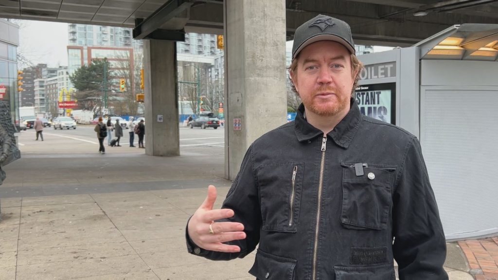 Andrew Coultard being interviewed outside Main Street-Science World Station