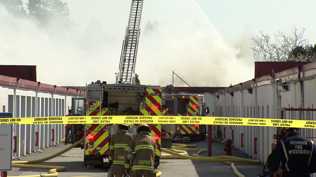 Crews respond to a structure fire at a self-storage facility