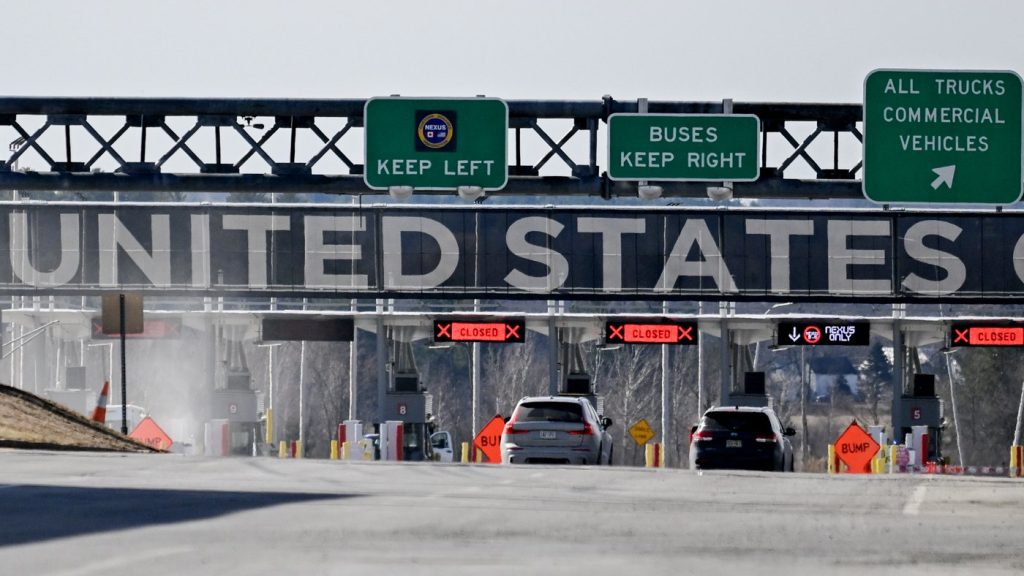 Vehicles approach the United States border crossing as seen from Saint-Bernard-de-Lacolle, Que., on April 10, 2025. THE CANADIAN PRESS/Graham Hughes