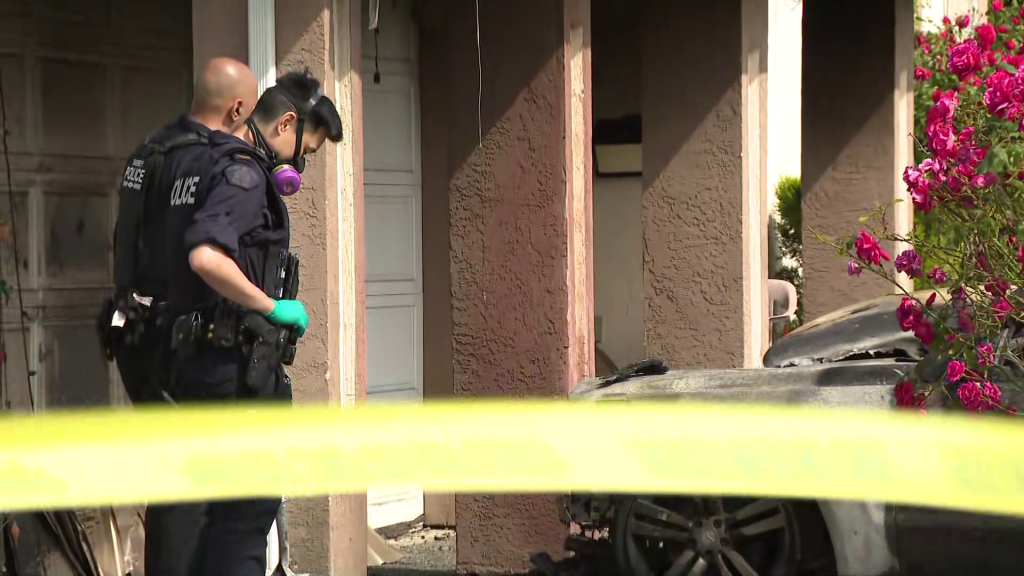 Police in surrey investigate a suspicious fire.