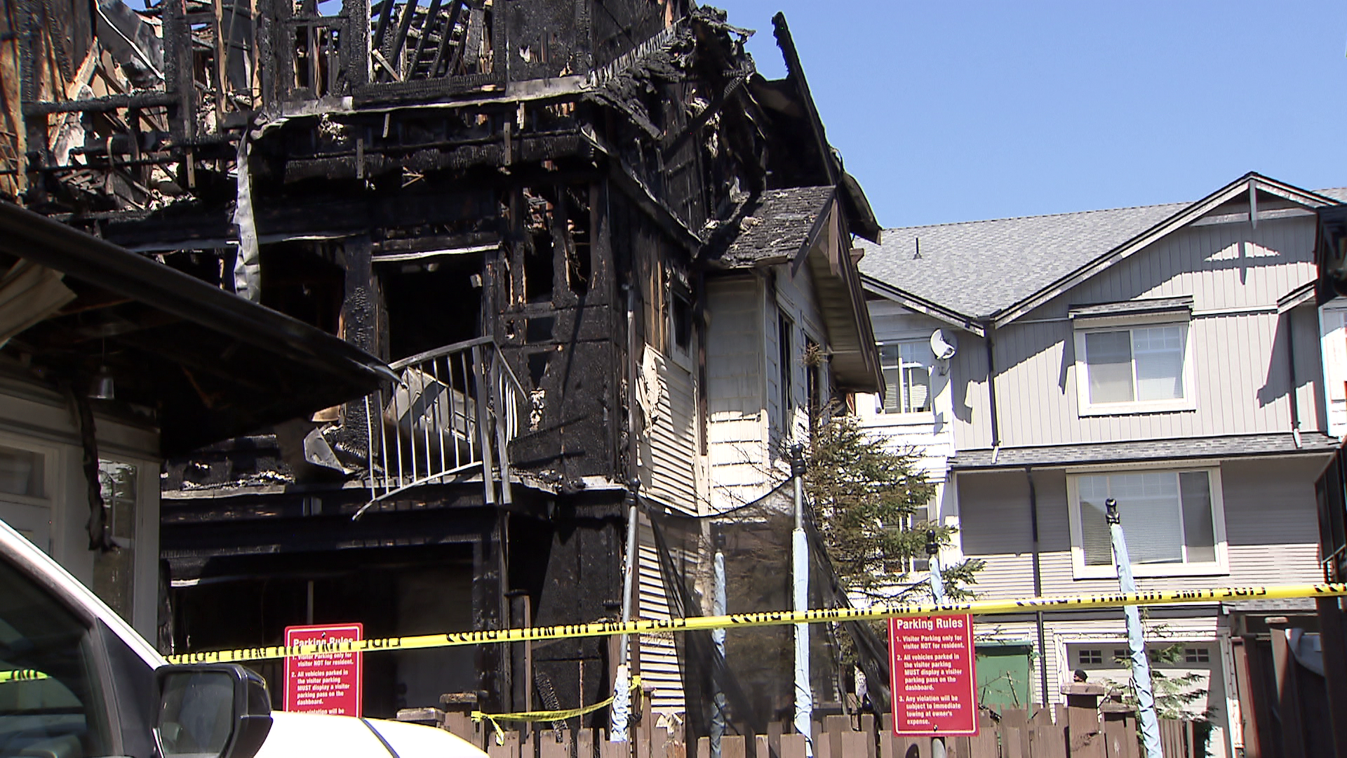Surrey townhouse complex fire sends thick black smoke into the air