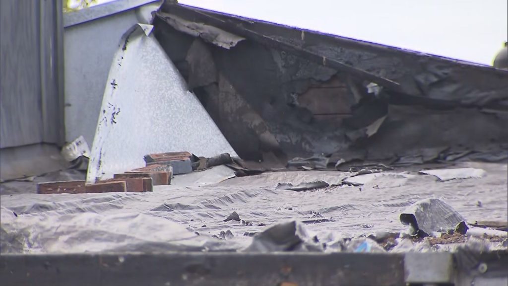 A burned out store front is seen in New Westminster