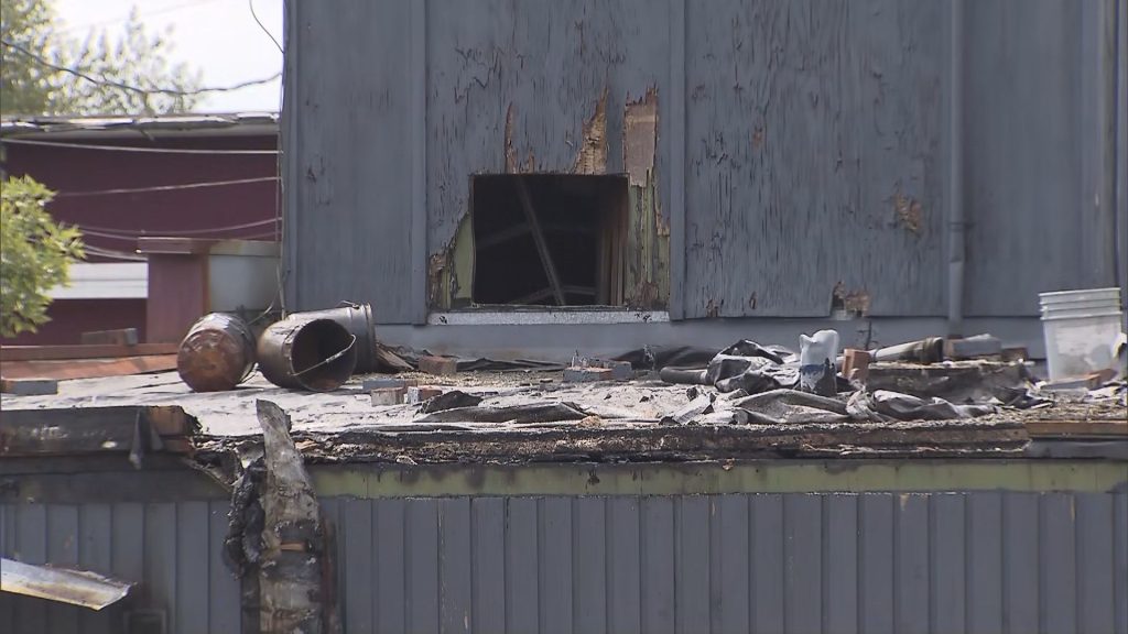 A burned out store front is seen in New Westminster