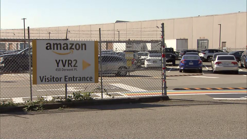 Unifor representatives are seen outside Amazon's fulfilment centre, in Delta, B.C., on Tuesday, September 16, 2025.