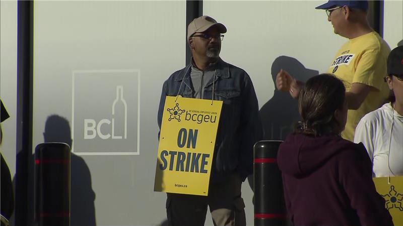 People on strike outside a B.C. liquor store