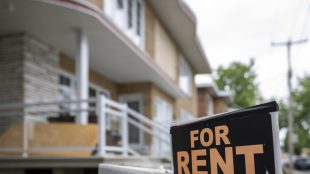 For rent sign outside a duplex.