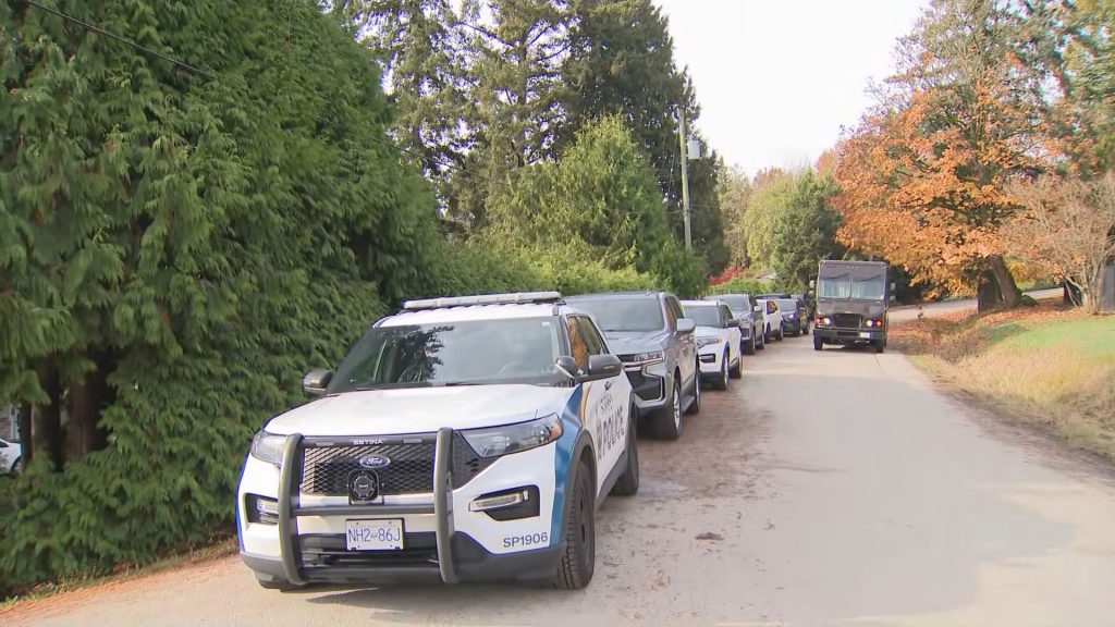 Police respond to reports of shots fired at a residence in Surrey on Oct. 30, 2025