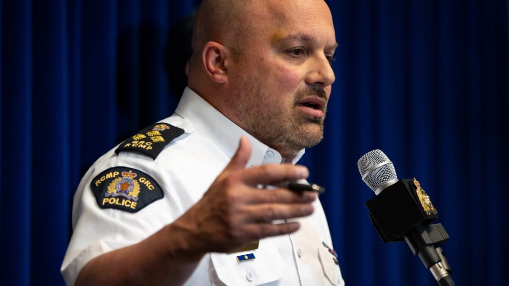 RCMP Assistant Commissioner David Teboul speaks during an RCMP news conference, in Surrey B.C., on Thursday, April 10, 2025. THE CANADIAN PRESS/Ethan Cairns
