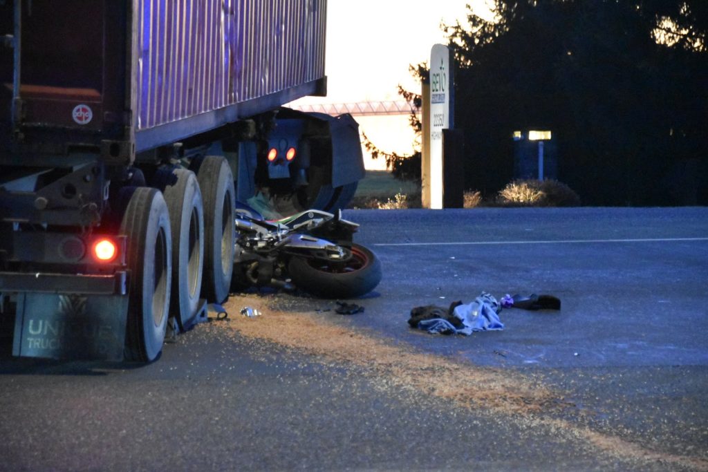 Motorcycle crashes with semi-truck in Langley