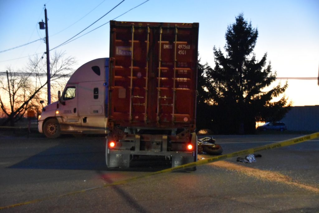 Motorcycle crashes with semi-truck in Langley