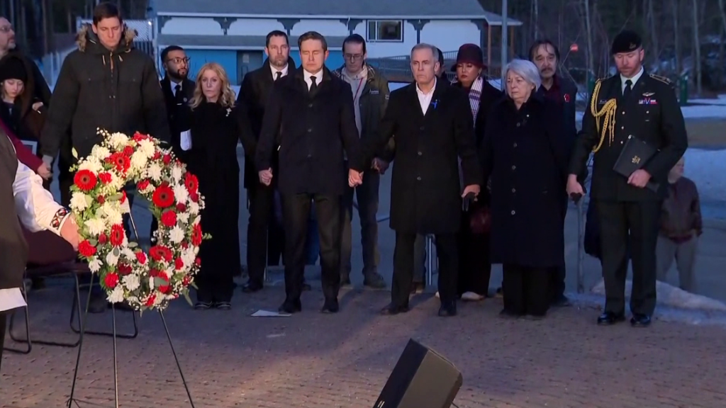 Prime Minister Carney and other leaders attend a vigil in Tumbler Ridge Feb. 13, 2026. (Broadcast Pool Image)