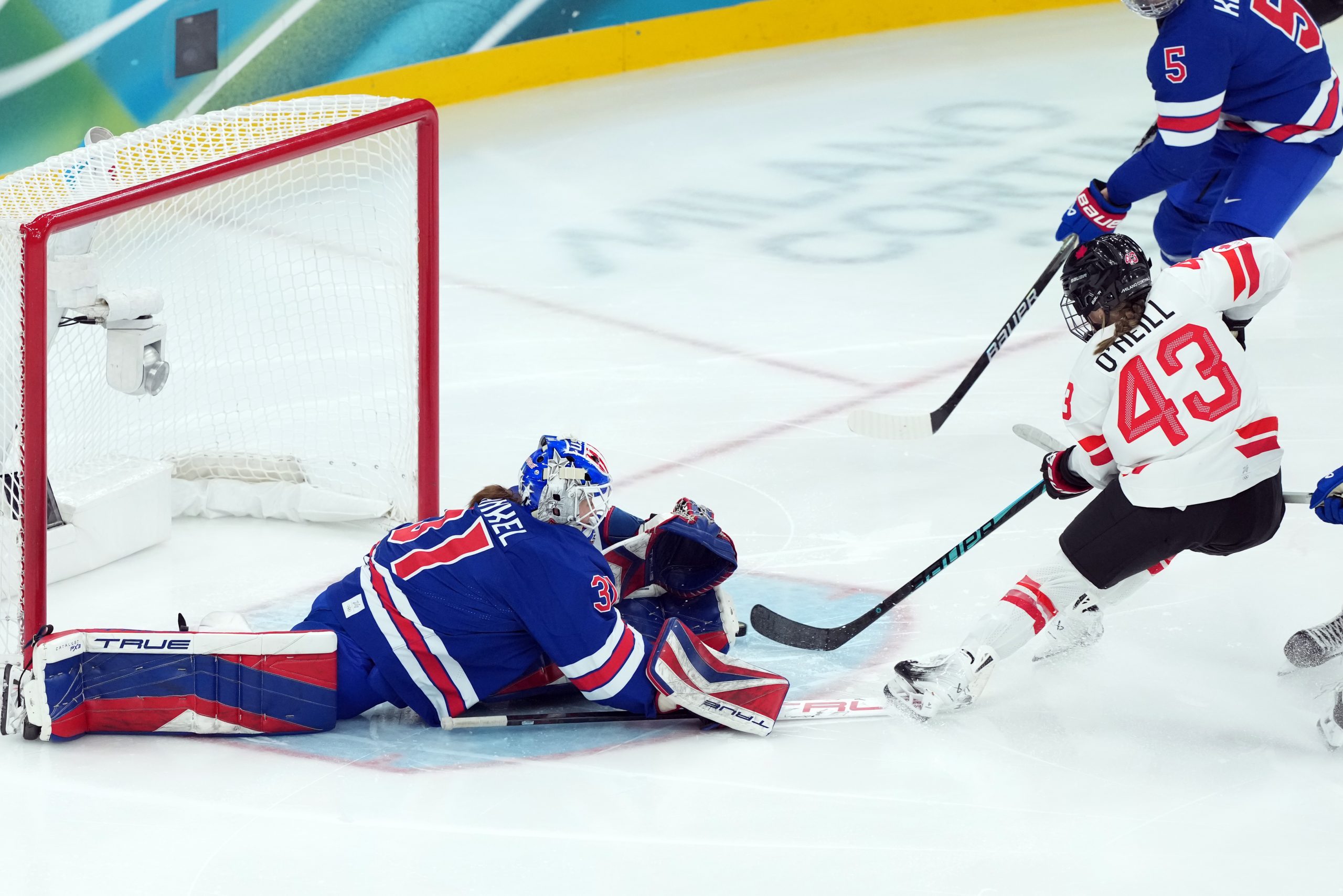 U.S. beats Canada 2-1 in overtime to claim gold in women’s hockey