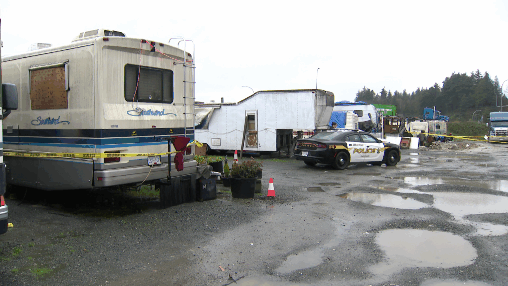 Abbotsford Police investigate a homicide in the park-and-ride lot off Parallel Road near Whatcom Road on Tuesday March 24, 2026.